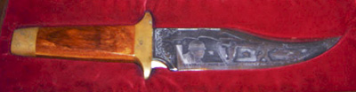 An engraved Audie Murphy collectors knife.