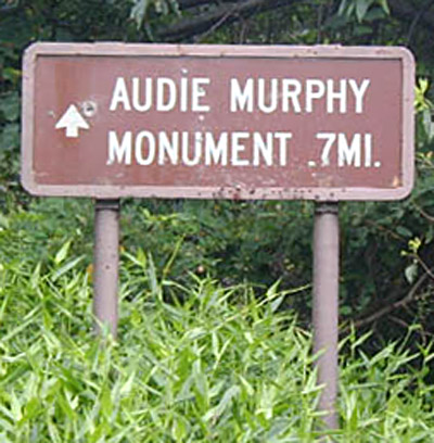 Audie Murphy Memorial sign at main gate and parking lot. Photo provided by Fred Davis.