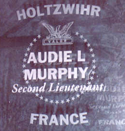 Etched glass panel of Audie Murphy at the Congressional Medal of Honor Memorial, Indianapolis, Indiana. Photo source: Kenneth Leff.