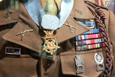 Closeup of Audie Murphy's military ribbons on the mannequin display at the National Infantry Museum, Fort Benning, Georgia.