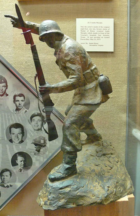National Infantry Museum display of a small bronze scale replica statue. The original statue is found in front of the Audie Murphy Veterans Memorial Hospital, San Antonio Texas.