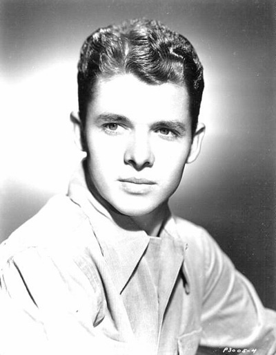 A portrait photo of Audie Murphy