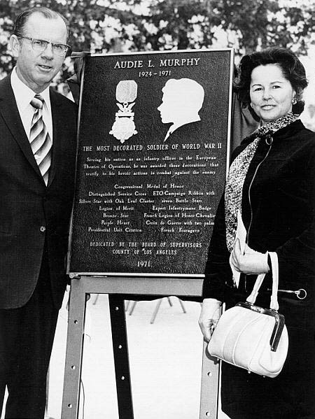 Patriotic Hall dedication ceremony. Supervisor Kenneth Hahn and 
Pamela Archer Murphy unveil a historical marker honoring Audie Murphy.