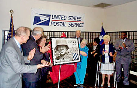 Left to right are Congressman Sam Johnson, Senator Phil Grahmm, Nadine Murphy, Congressman Ralph Hall, Billie Murphy Tindol, Congresswoman Eddie Bernice Johnston, Diane Thomason, and USPS representative Carl January as the Audie Murphy commemorative stamp is unveiled in Dallas, Texas on October 24, 1999. Photo by Richard Rodgers.